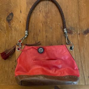 The Sak cherry red distressed leather purse